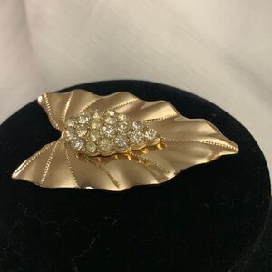 Vintage gold rhinestone leaf brooch